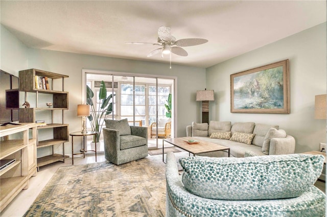 living room featuring ceiling fan