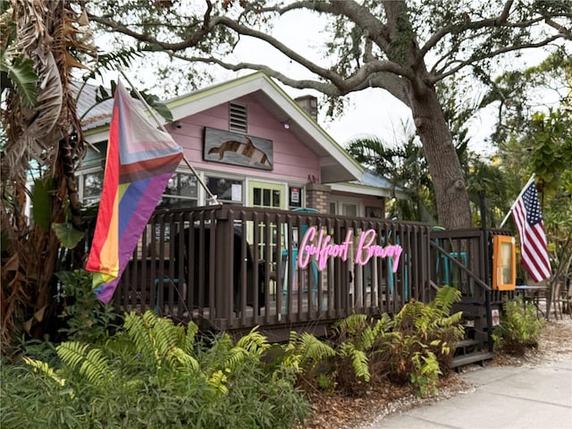 view of front of house featuring a wooden deck