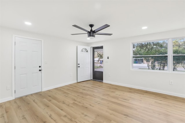 foyer featuring ceiling fan and light hardwood / wood-style flooring