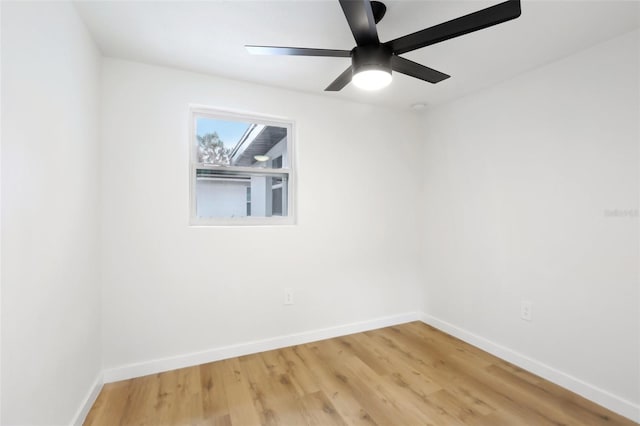 unfurnished room featuring hardwood / wood-style flooring and ceiling fan