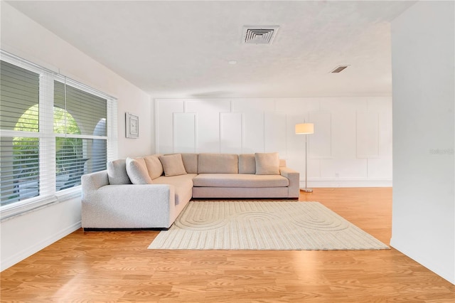 living room featuring light wood-type flooring