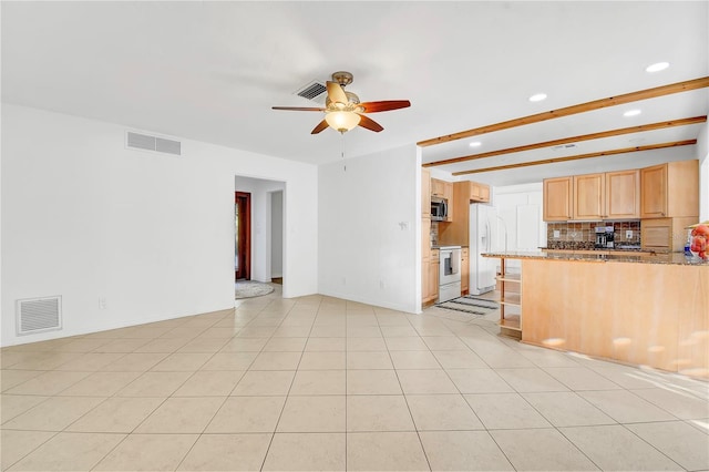 kitchen with light brown cabinetry, white appliances, ceiling fan, beam ceiling, and decorative backsplash