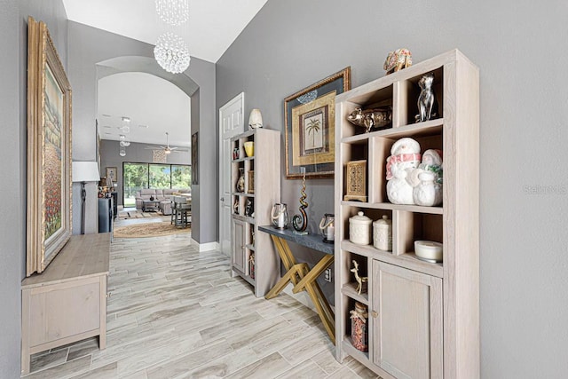 corridor with light hardwood / wood-style flooring