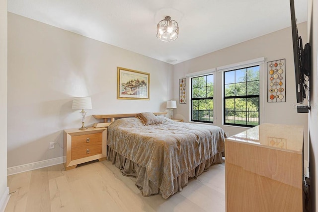 bedroom with light hardwood / wood-style floors