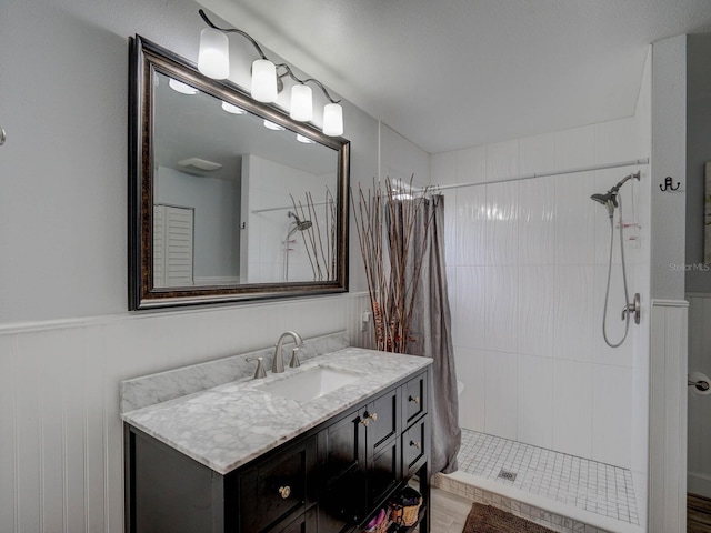 bathroom with vanity and a shower with shower curtain