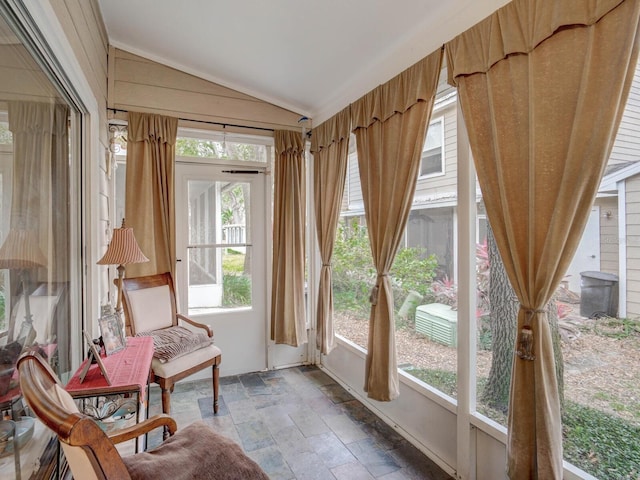 sunroom / solarium with lofted ceiling