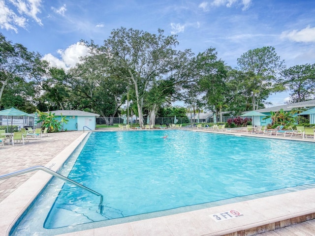 view of swimming pool featuring a patio