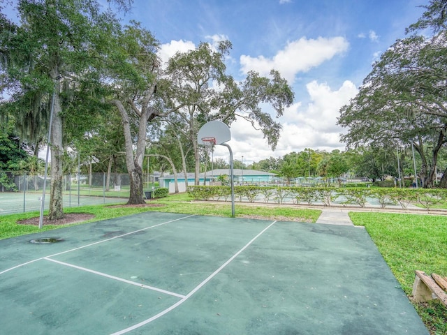 view of basketball court featuring tennis court