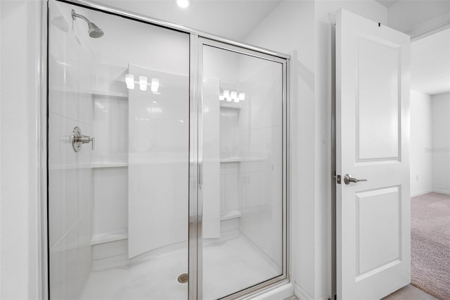 bathroom featuring an enclosed shower