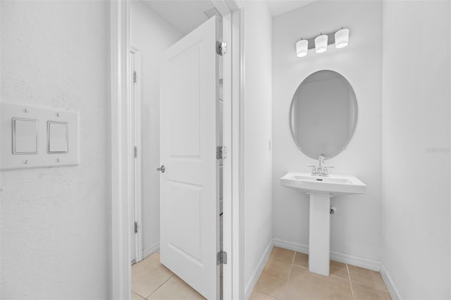 bathroom featuring tile patterned flooring