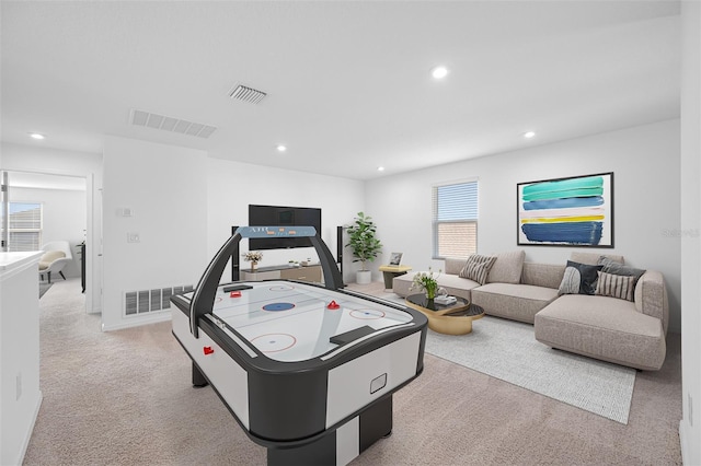 playroom featuring light colored carpet