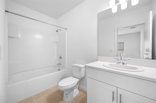 full bathroom with toilet, tile patterned flooring, washtub / shower combination, and vanity