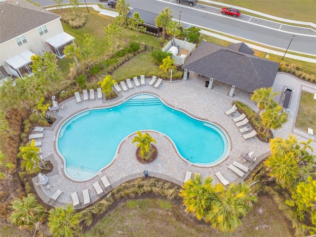 view of swimming pool with a patio area