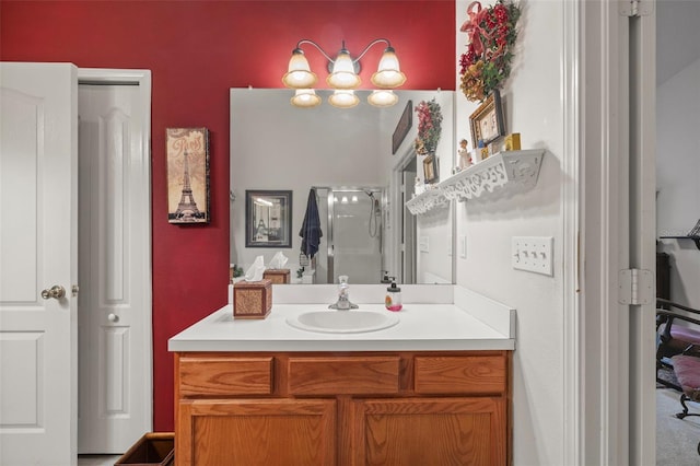 bathroom featuring a stall shower and vanity