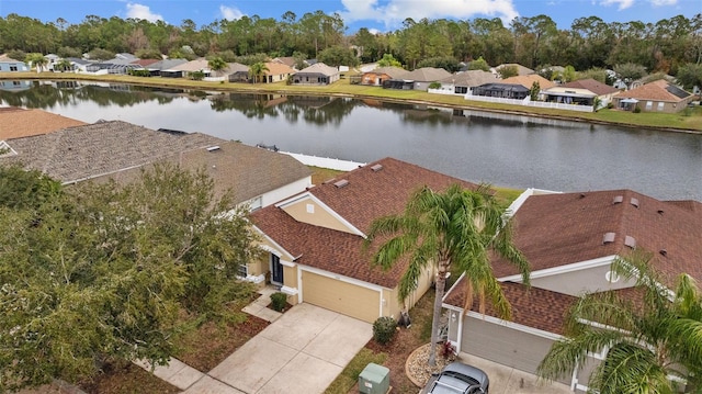 aerial view with a water view and a residential view