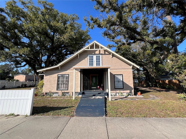 view of front of home with a front yard