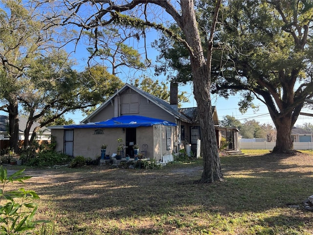 exterior space with a yard