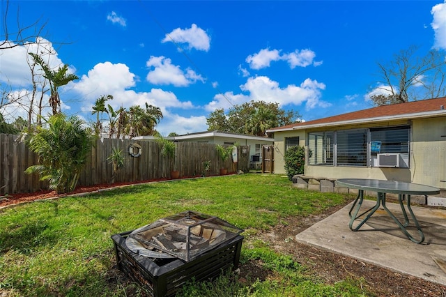 view of yard featuring a patio area and a fire pit