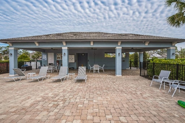 view of patio / terrace featuring ceiling fan