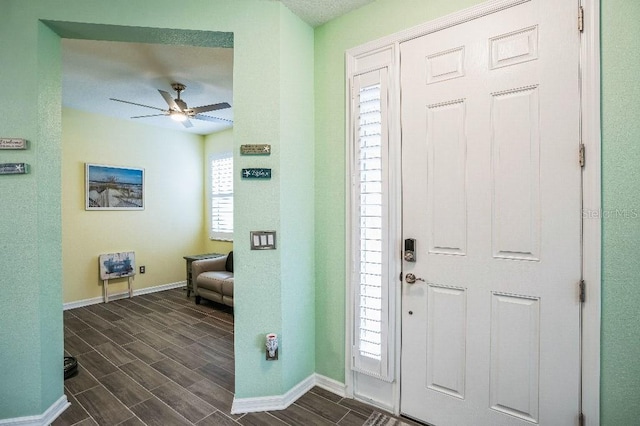 entryway with ceiling fan