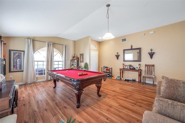 playroom with pool table, light hardwood / wood-style flooring, and vaulted ceiling