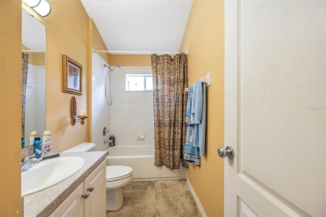 full bathroom featuring toilet, tile patterned floors, vanity, and shower / bath combo with shower curtain