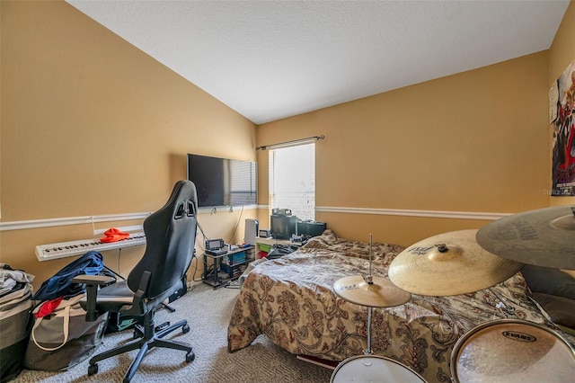 carpeted bedroom featuring lofted ceiling