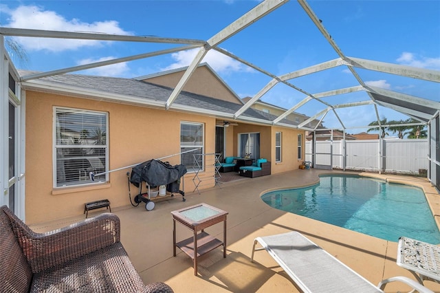 view of swimming pool with a patio area, a lanai, and an outdoor hangout area