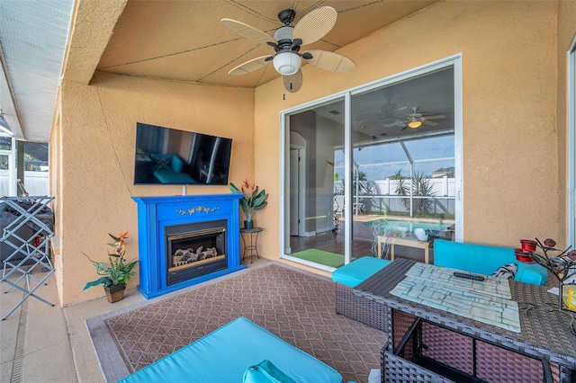 view of patio / terrace featuring a fireplace