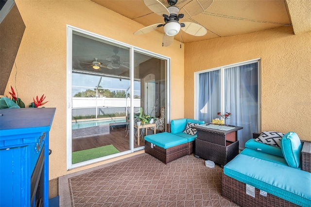 view of patio with ceiling fan