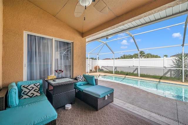 view of pool featuring an outdoor hangout area, ceiling fan, a patio area, and a lanai