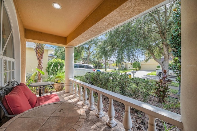 balcony featuring a porch