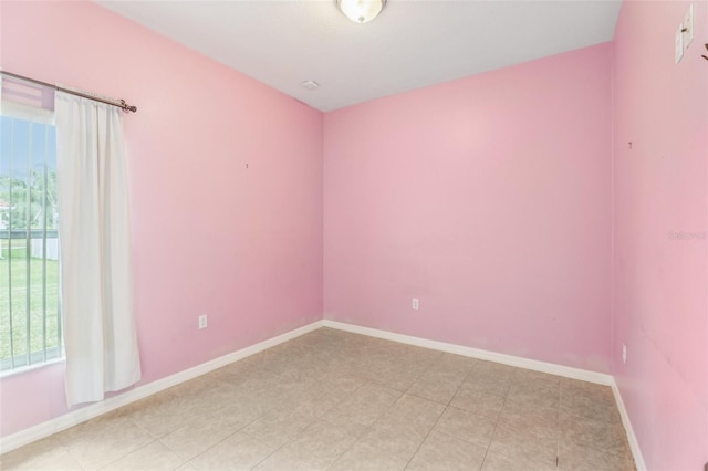 spare room featuring plenty of natural light