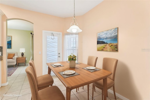 dining room with light tile patterned flooring