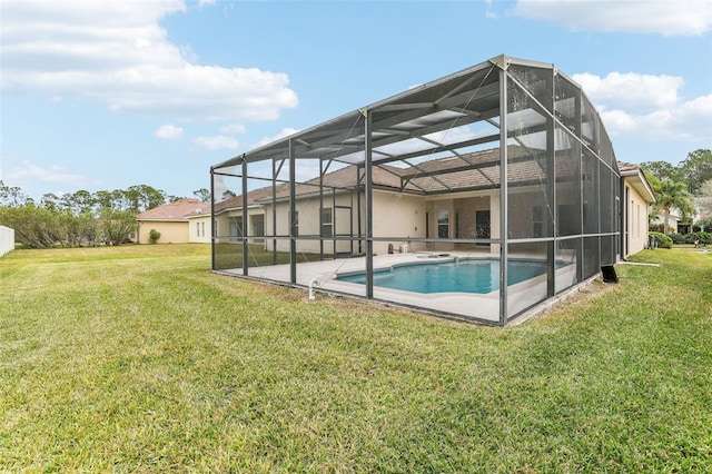 view of pool featuring a patio, a lanai, and a lawn