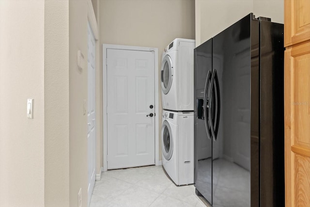 washroom with stacked washer and clothes dryer