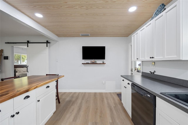 kitchen featuring white cabinets, a barn door, black dishwasher, and wooden ceiling