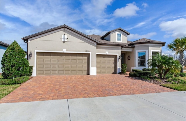 view of front of home with a garage