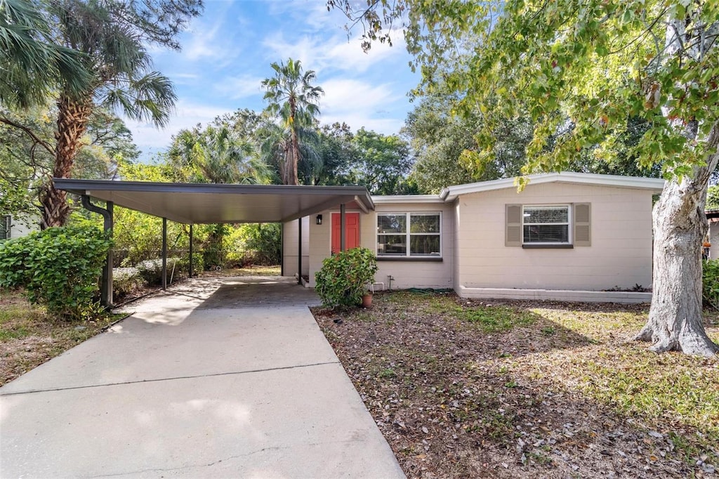 view of front of house featuring a carport