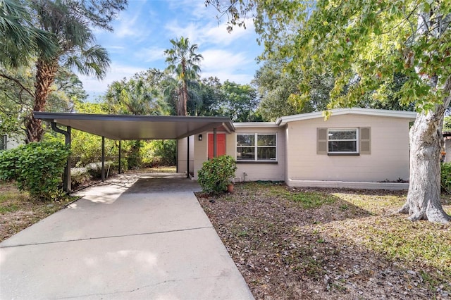 view of front of house featuring a carport