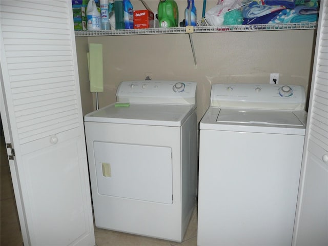 laundry room with washer and clothes dryer