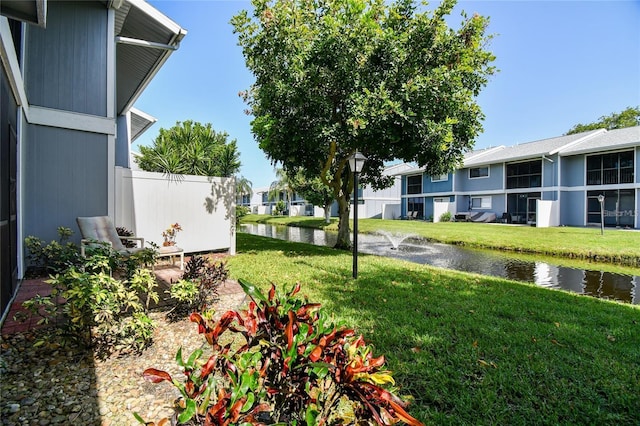 view of yard featuring a water view