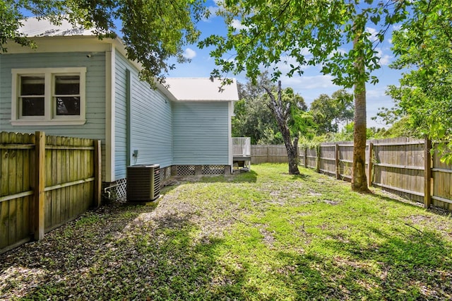 view of yard with central AC