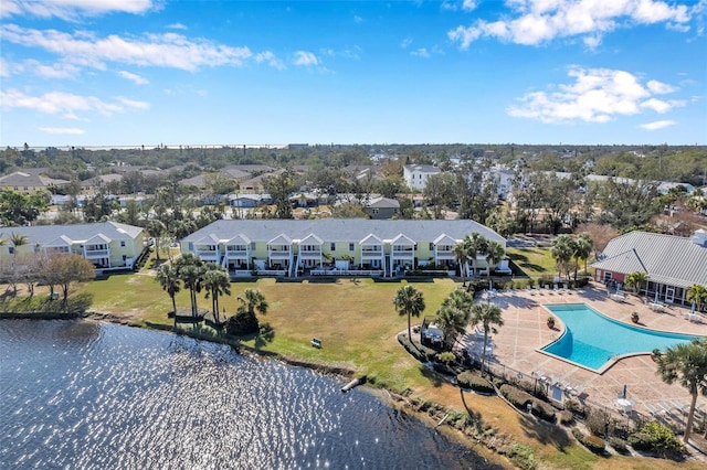 bird's eye view featuring a water view and a residential view