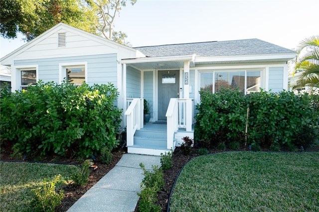 view of front of home with a front yard