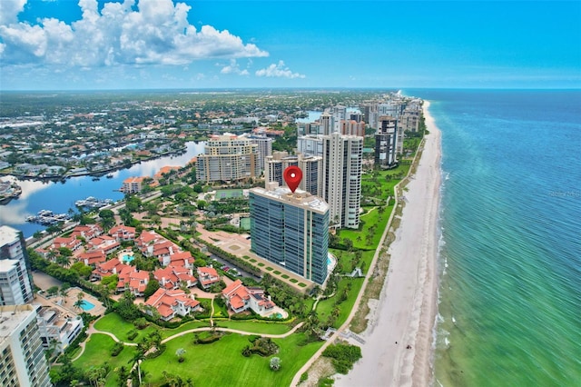 bird's eye view with a beach view and a water view