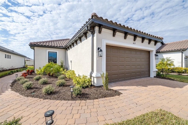 exterior space featuring a garage