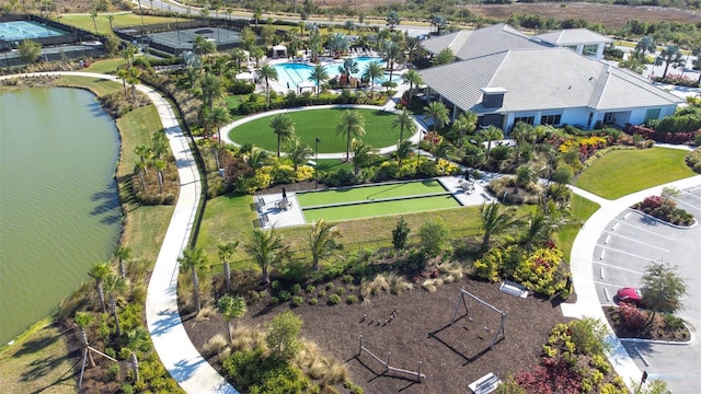 birds eye view of property with a water view