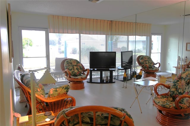 living room featuring plenty of natural light