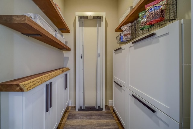 interior space with dark wood-type flooring